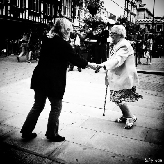 Dancing in the Streets of Lincoln on World Photography Day by Paul Brown